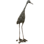 A wrought iron sculptural crane that stands so tall,